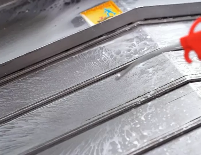 Vertical CNC Machining Center Work Table Cleaning